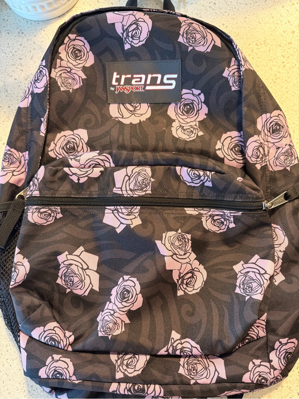 JanSport Trans Black Backpack with Violet Rose Print